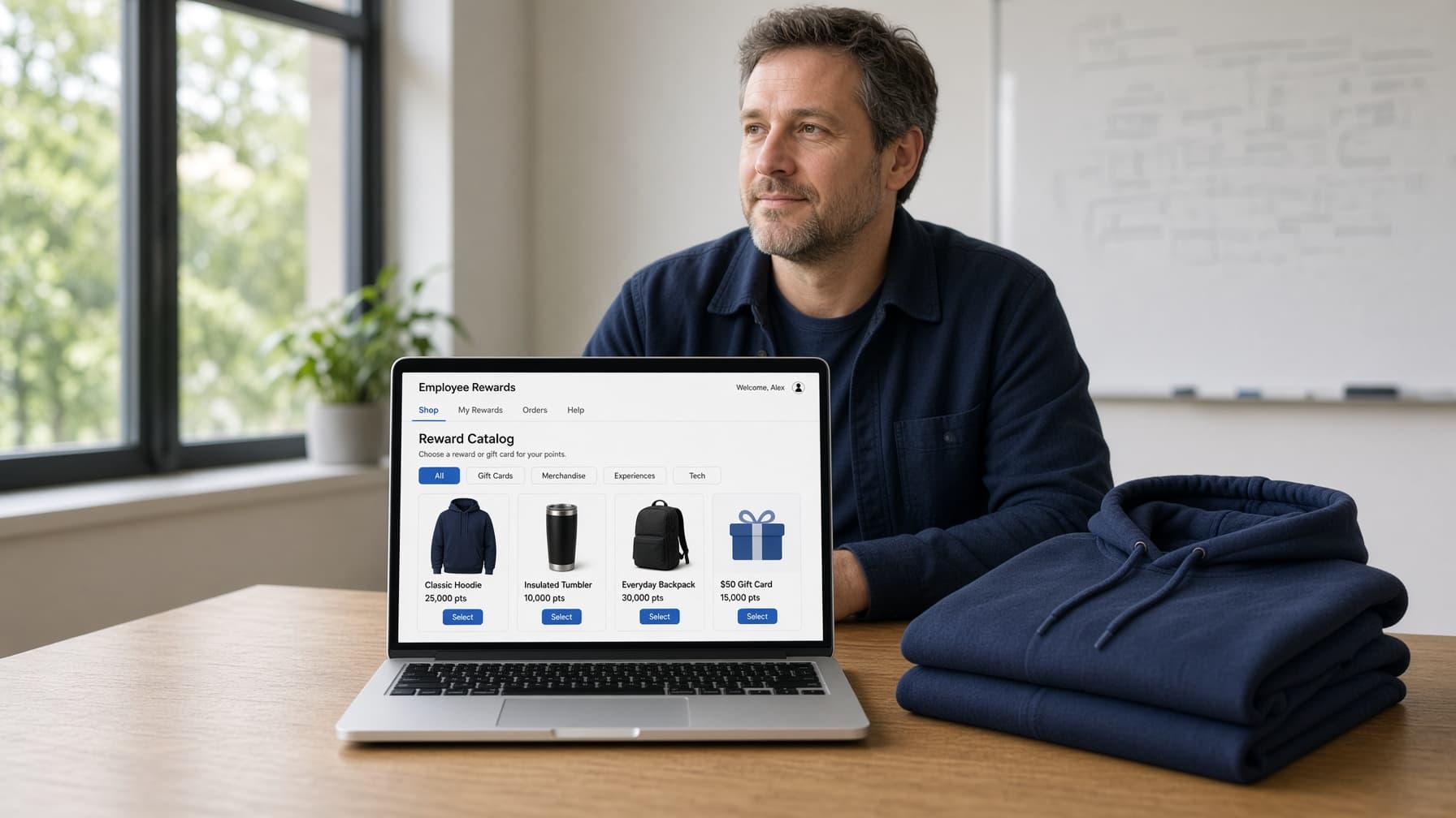 A merchandiser pitching a live branded shop on a laptop